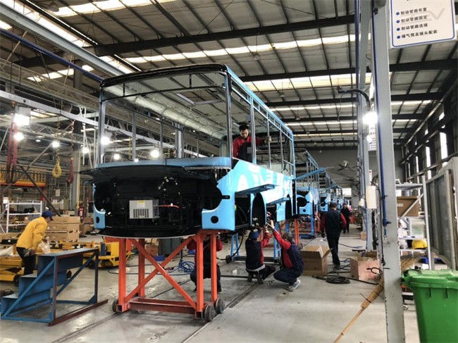 Autobús eléctrico mini de 7m de longitud con 200 km de autonomía y volante a la izquierda para transporte público